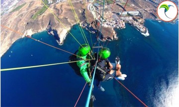 Tandem paragliding flight...